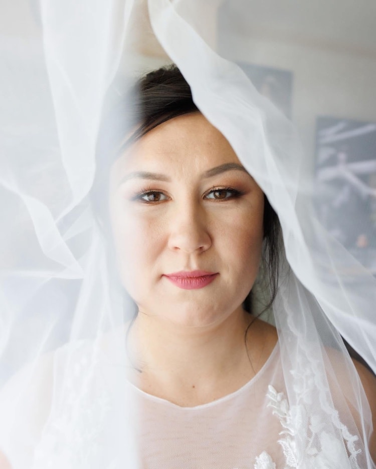 Bridal portrait with flowing veil