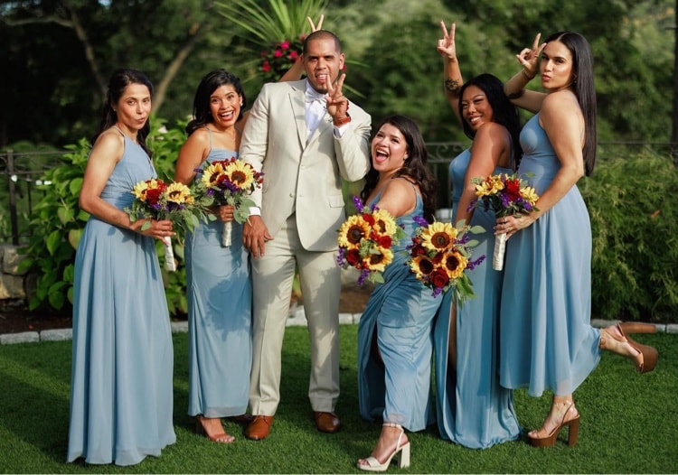 Bridal party having fun outdoors
